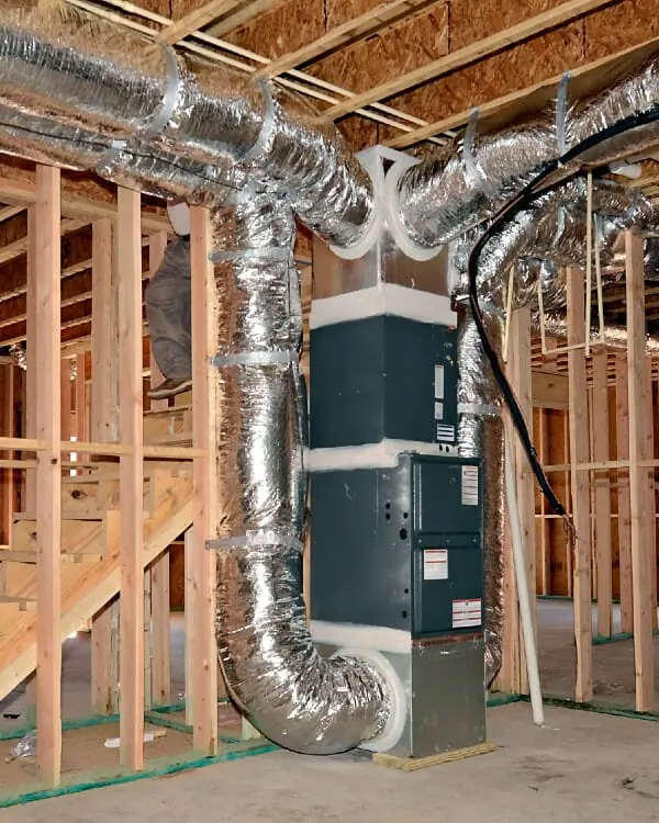 Ductwork coming out of heating system in basement